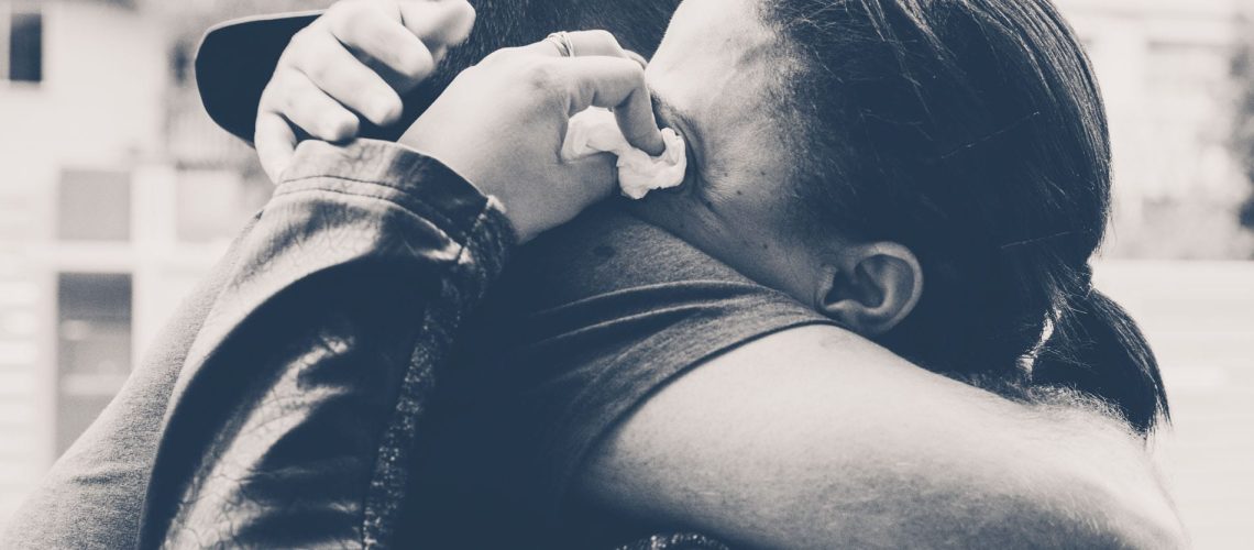COUPLE HUGGING