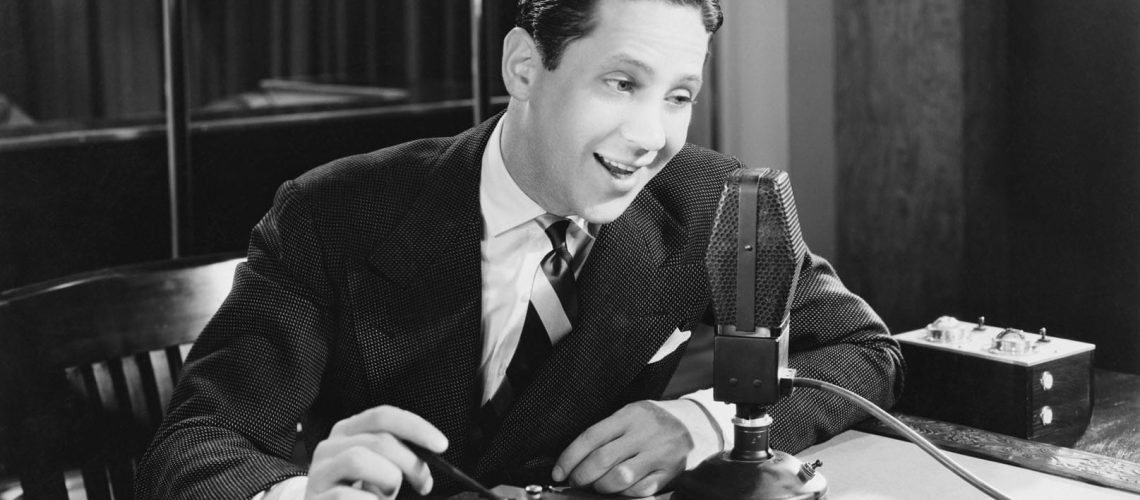 GUY BLACK AND WHITE RADIO ANNOUNCER