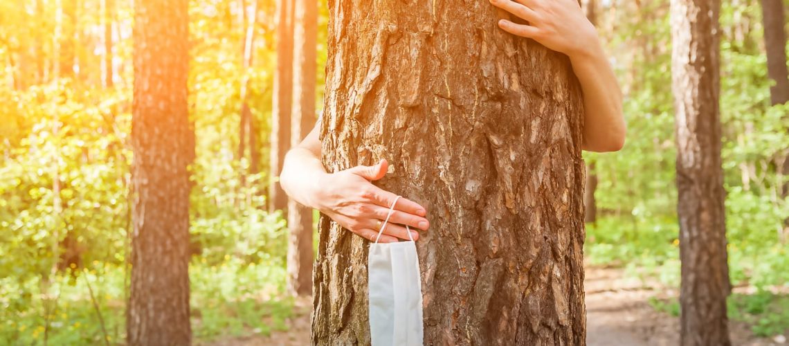 Quarantine,End,Concept.,Hands,Hug,A,Tree,Close-up,And,Copy